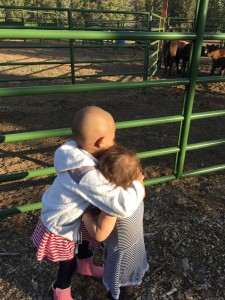 Enjoying the calves with her sister