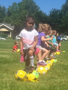 Charlotte loves playing soccer lately